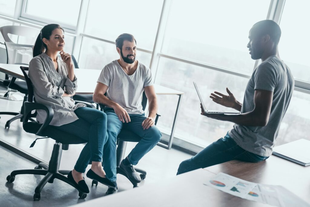 Young professional team discussing business plan in the office